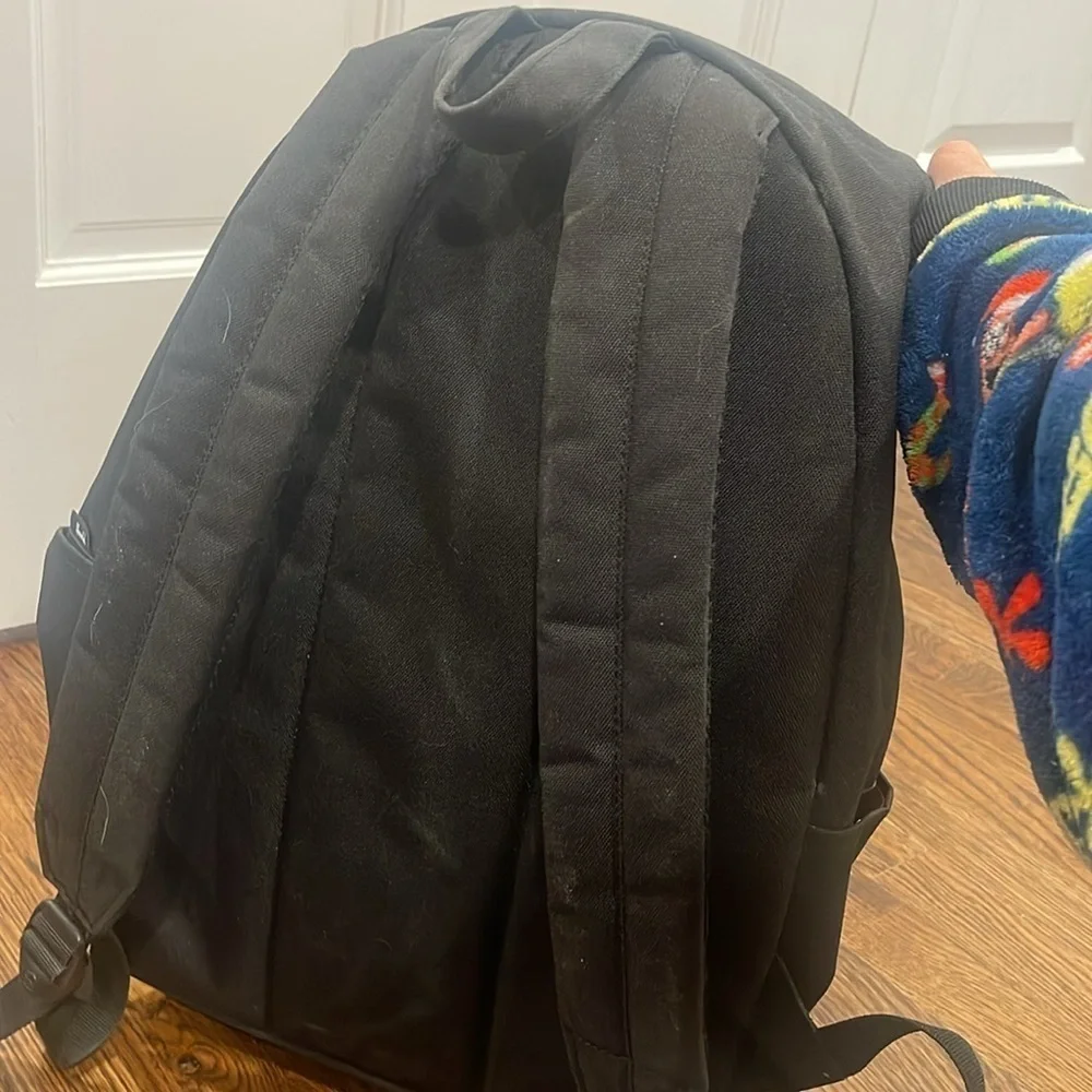 Use Herschel black book bag